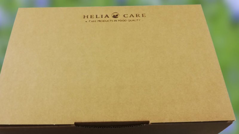 HeliaCARE Paket mit Brandstempel